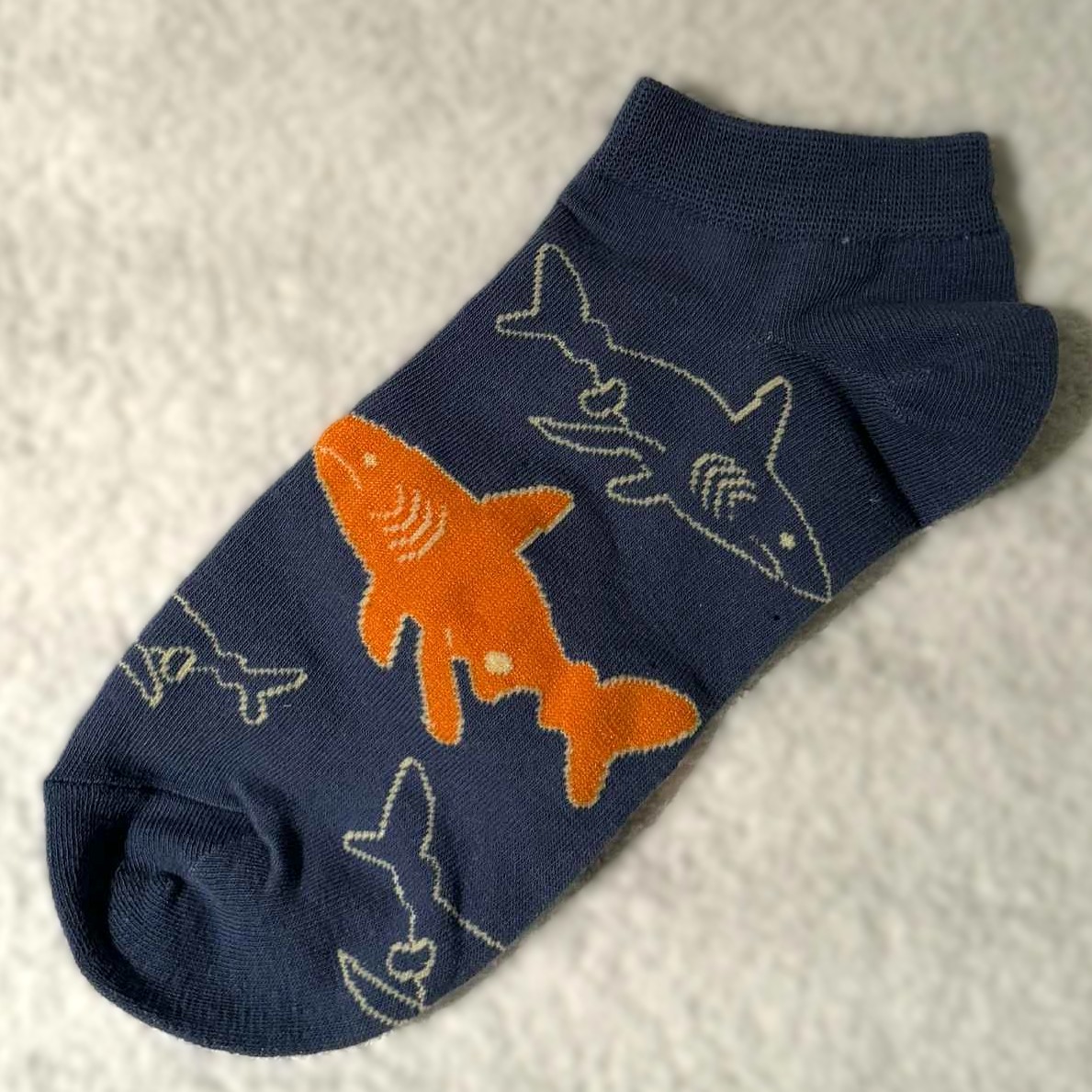 Ankelsokk med Haier som svømmer