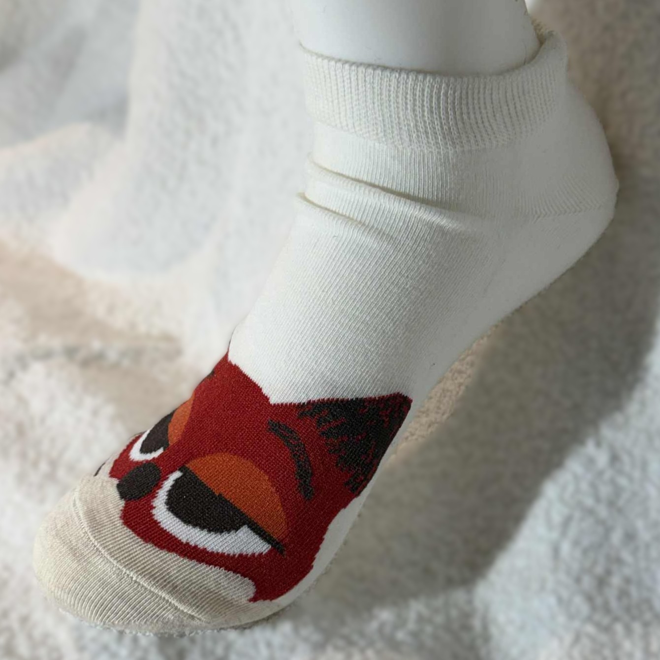 Ankelsokk med dyreansikt