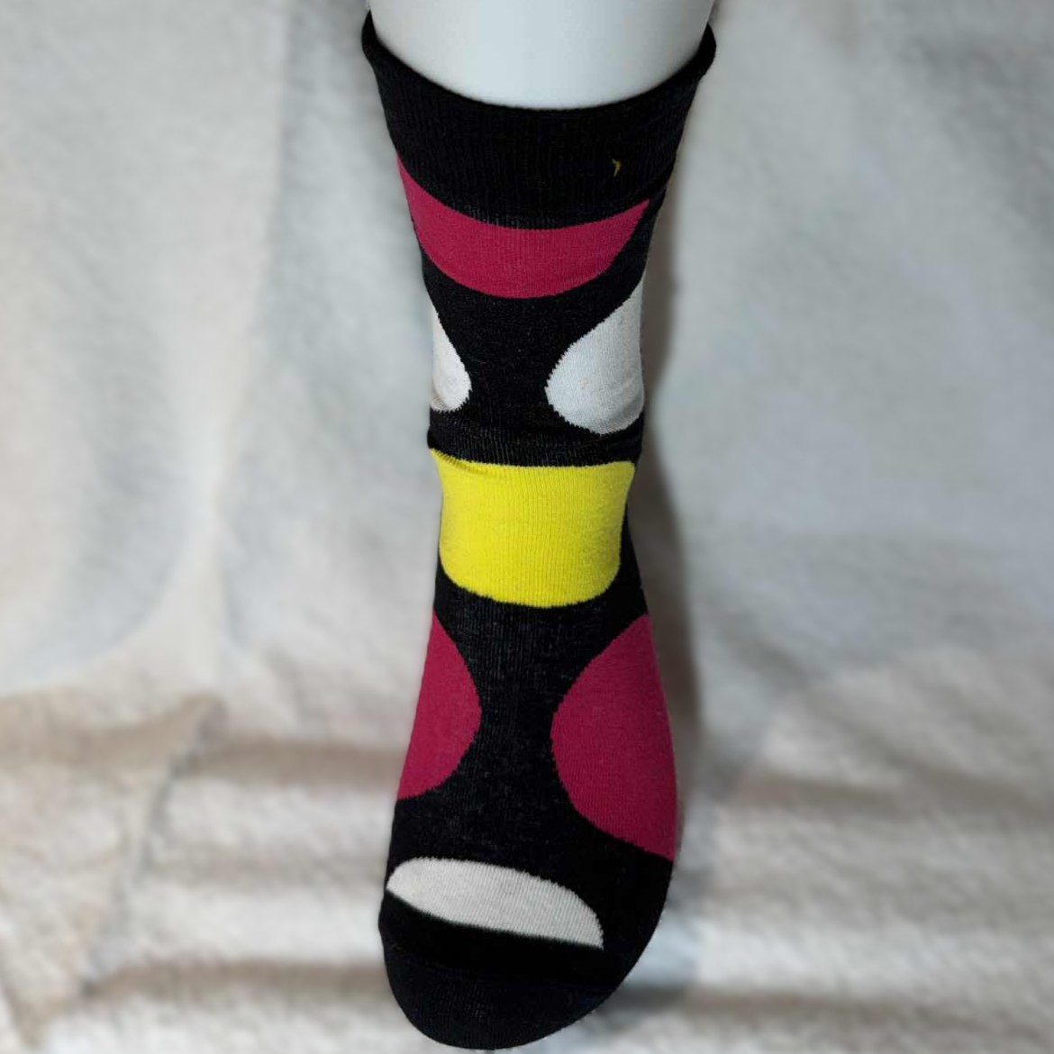 Sokk med sirkler i farger