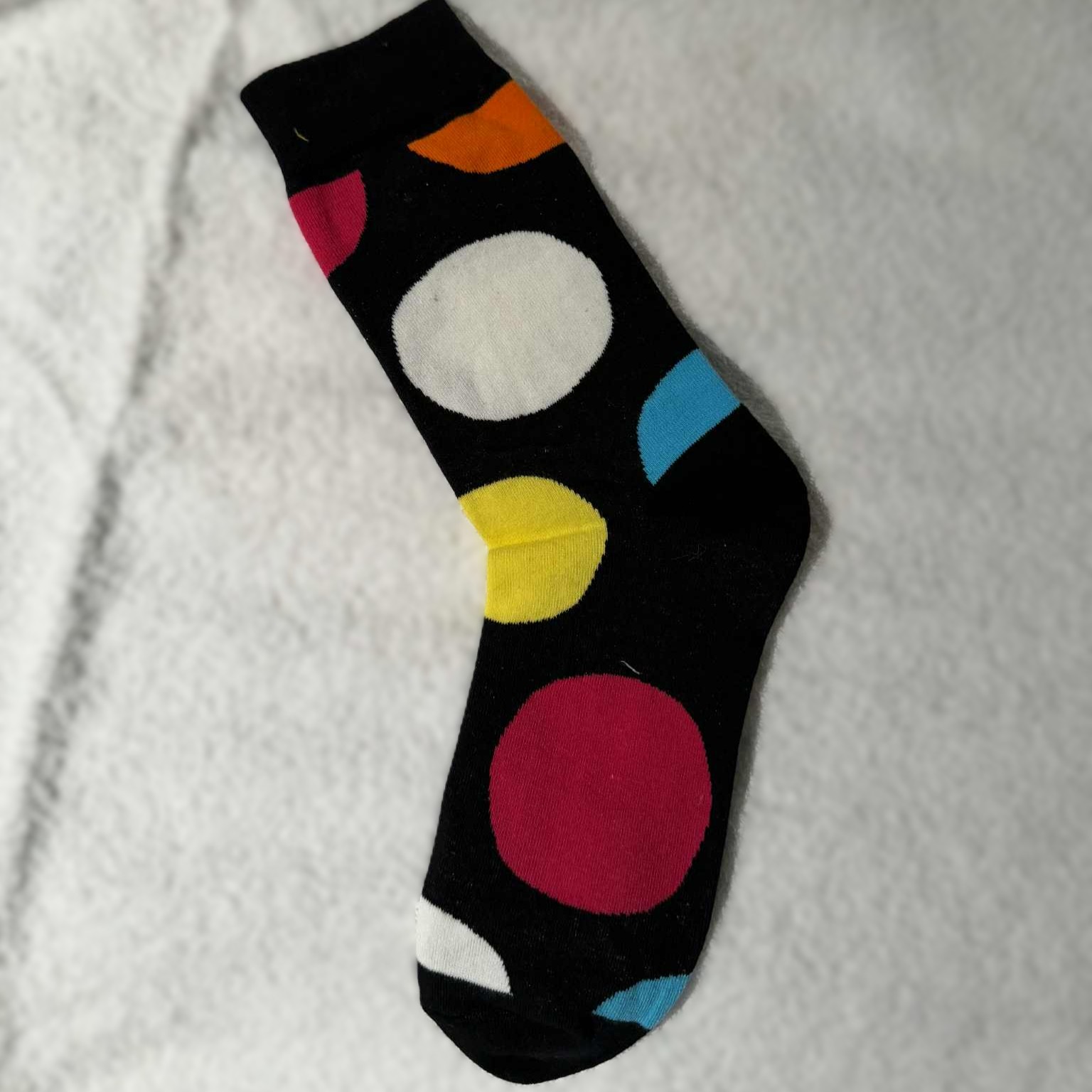 Sokk med sirkler i farger